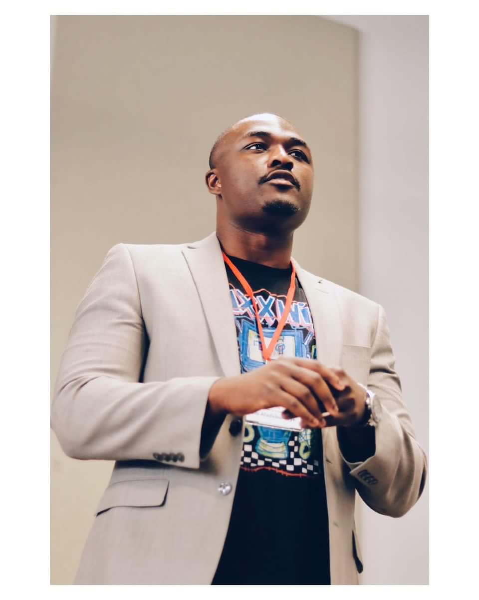 Olumuyiwa at a conference